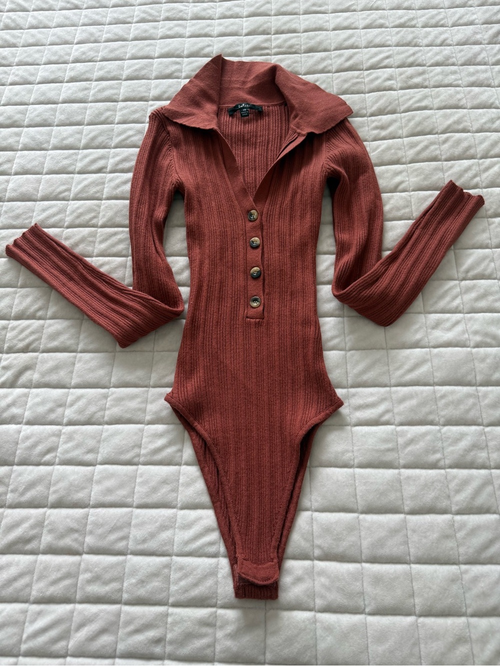 Ribbed Long Sleeve One-Piece Bodysuit in Rust
